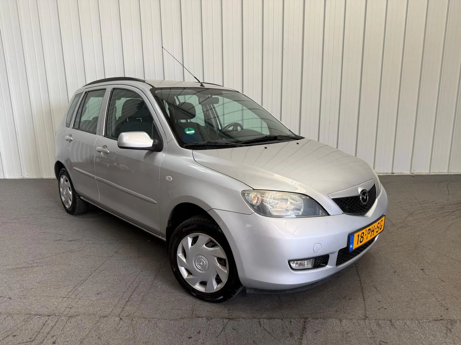 Mazda 2 (2004) — foto 1