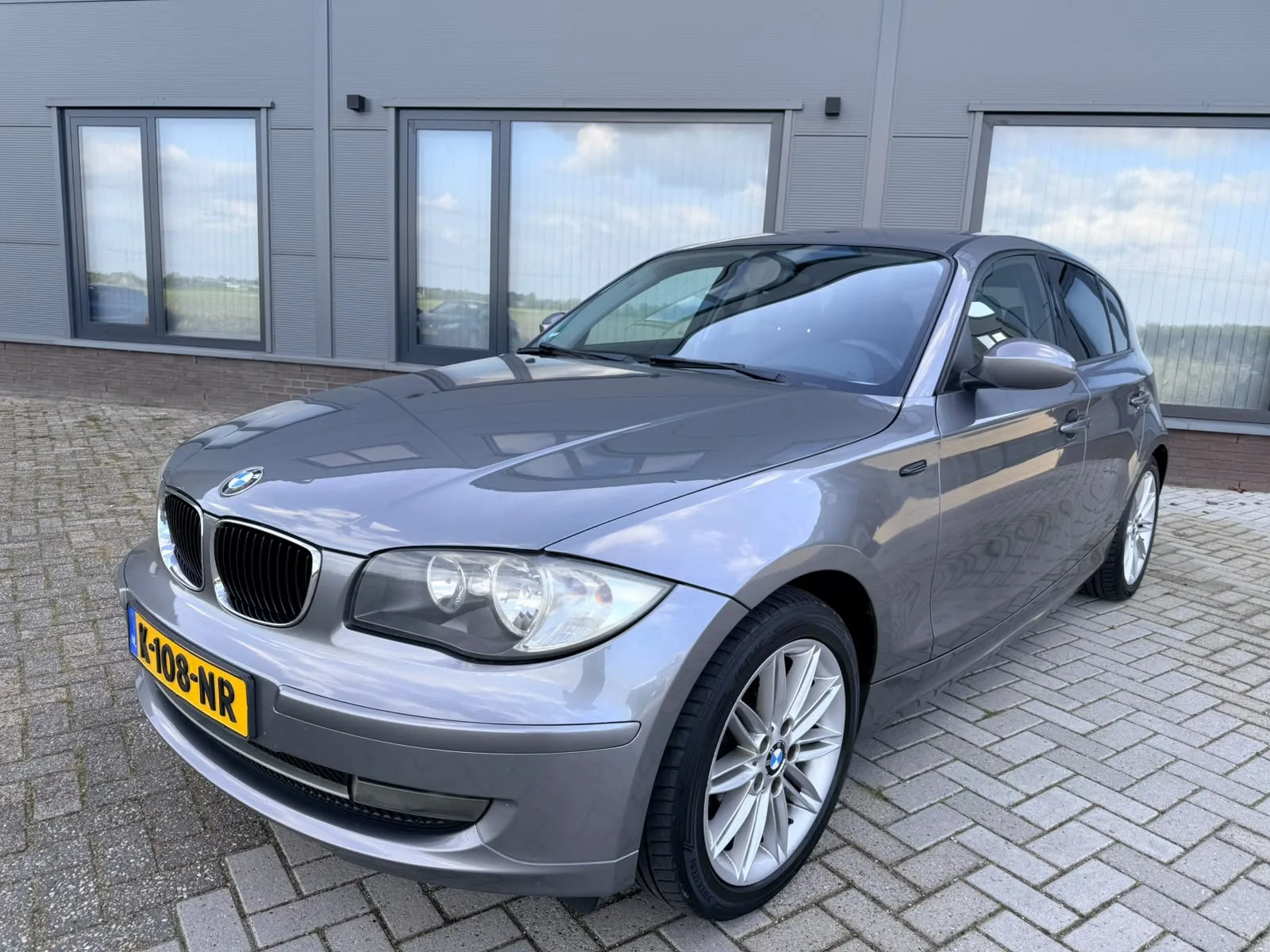 BMW 1-Serie (2008) — foto 1
