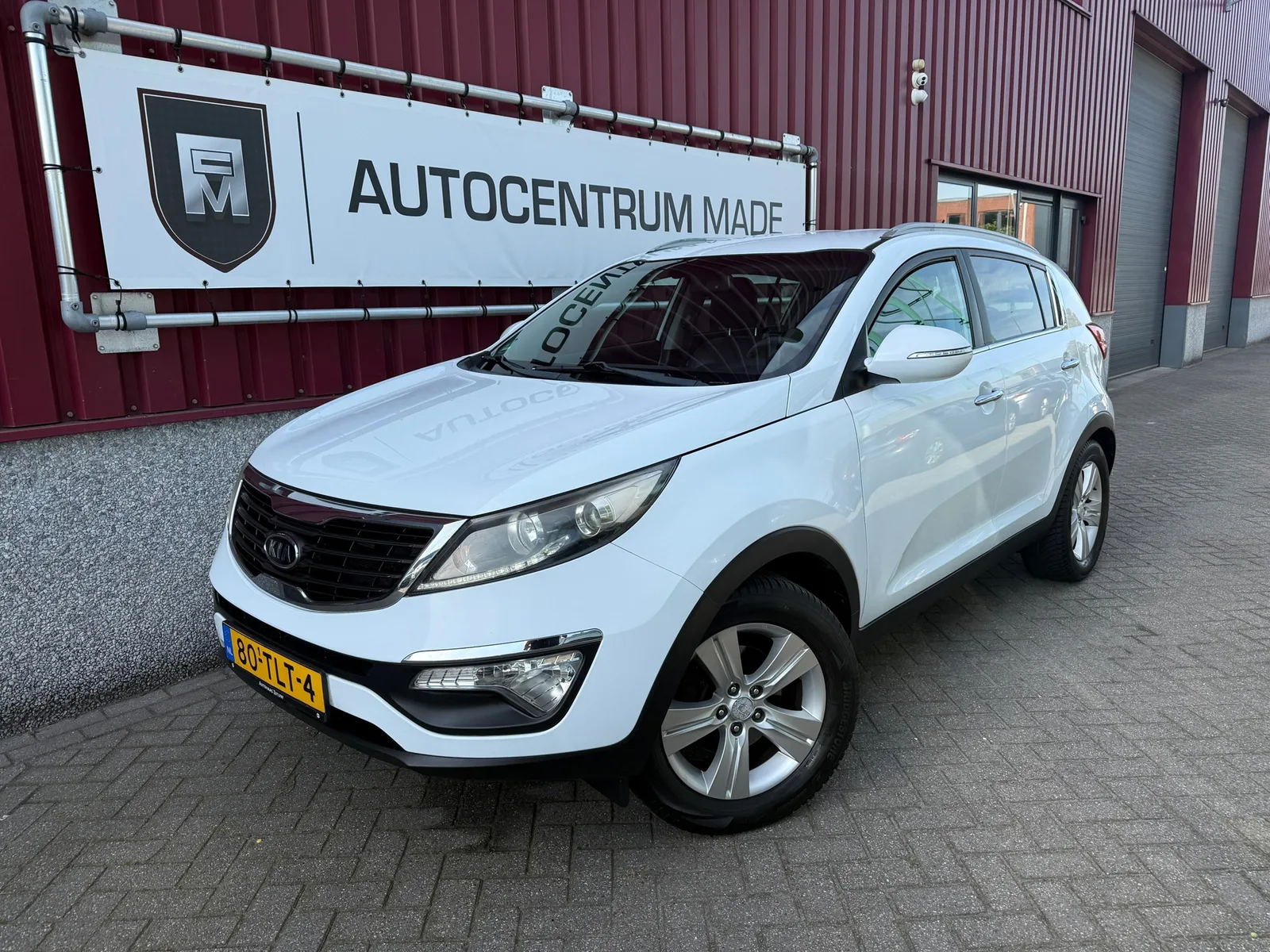 Kia Sportage (2012) — foto 1
