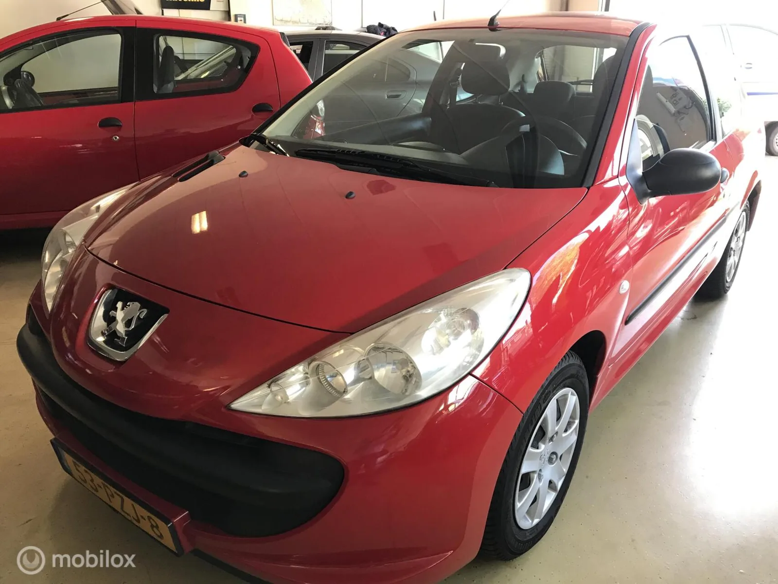 Peugeot 206 (2011) — foto 1