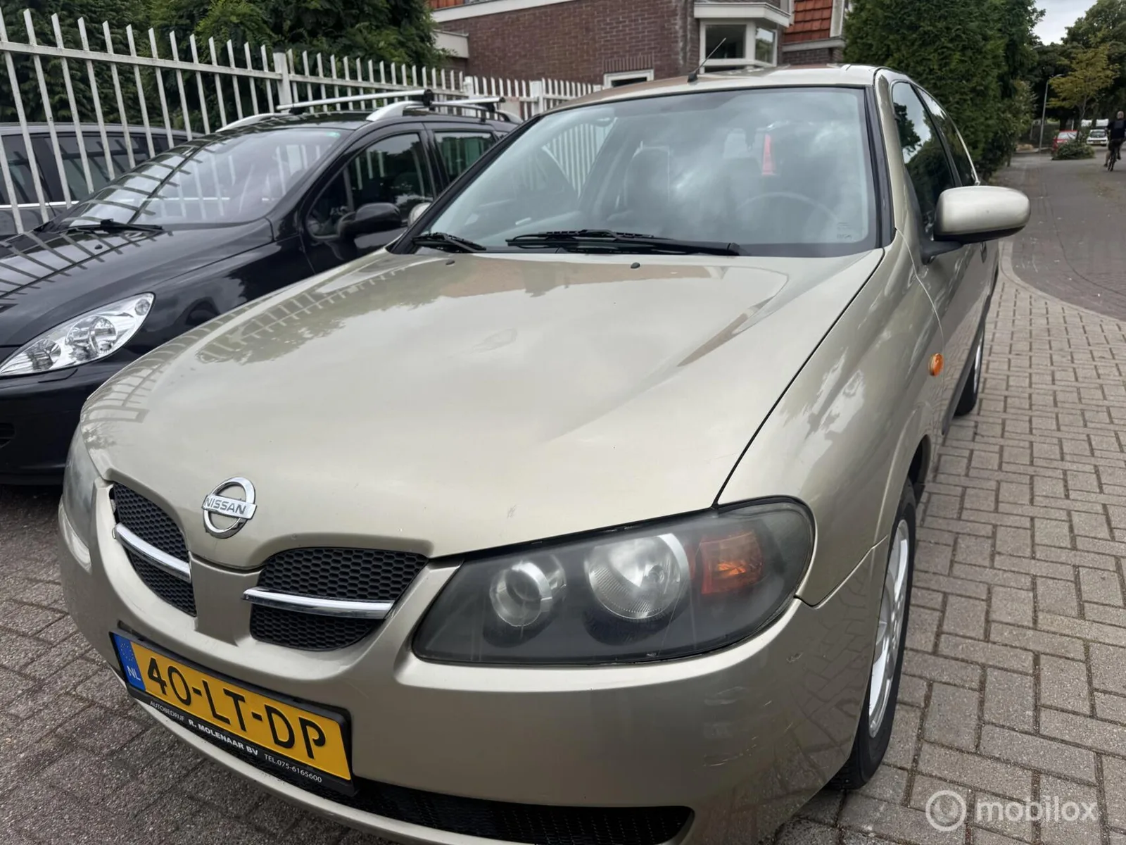 Nissan Almera (2003) — foto 1
