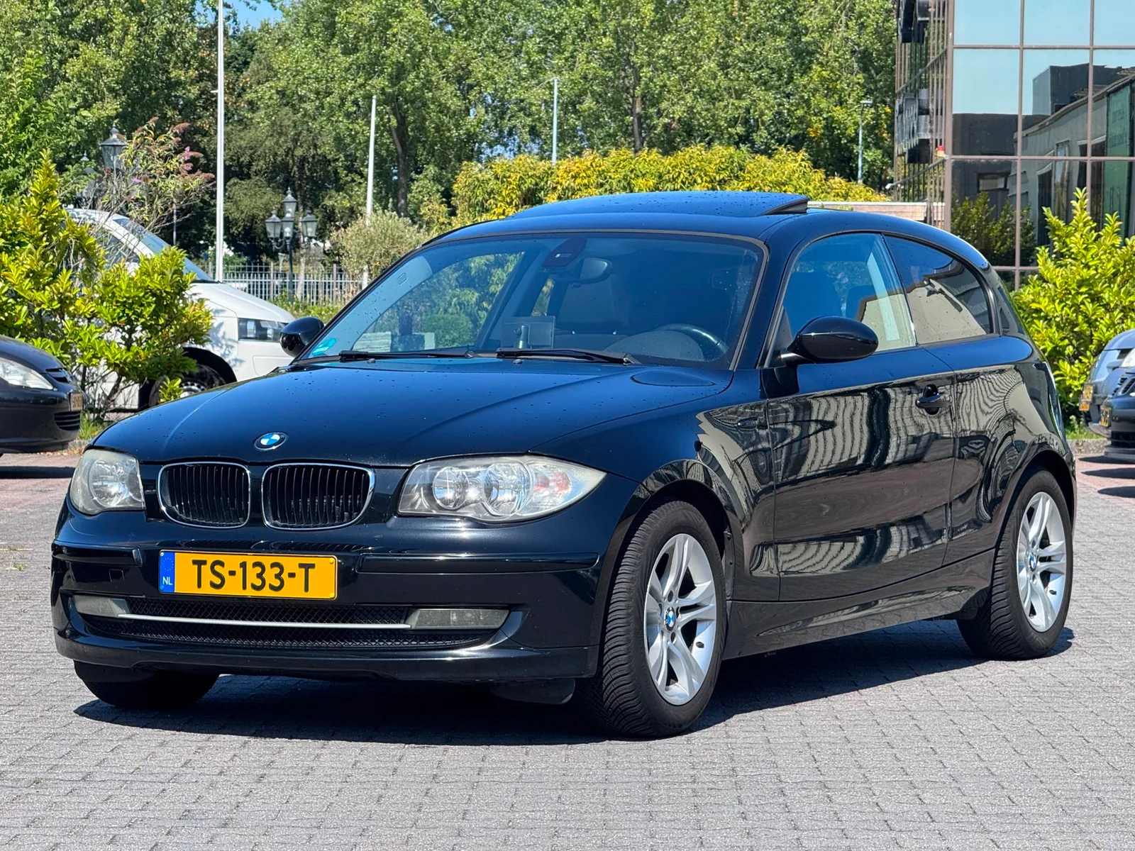 BMW 1-Serie (2009) — foto 1