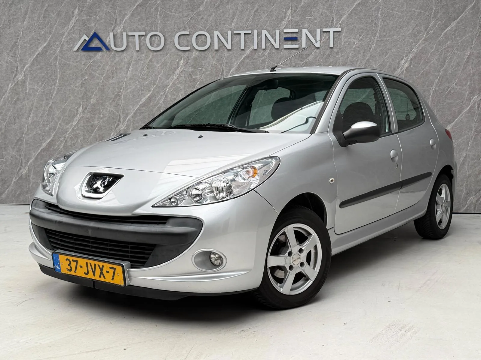 Peugeot 206 (2009) — foto 1