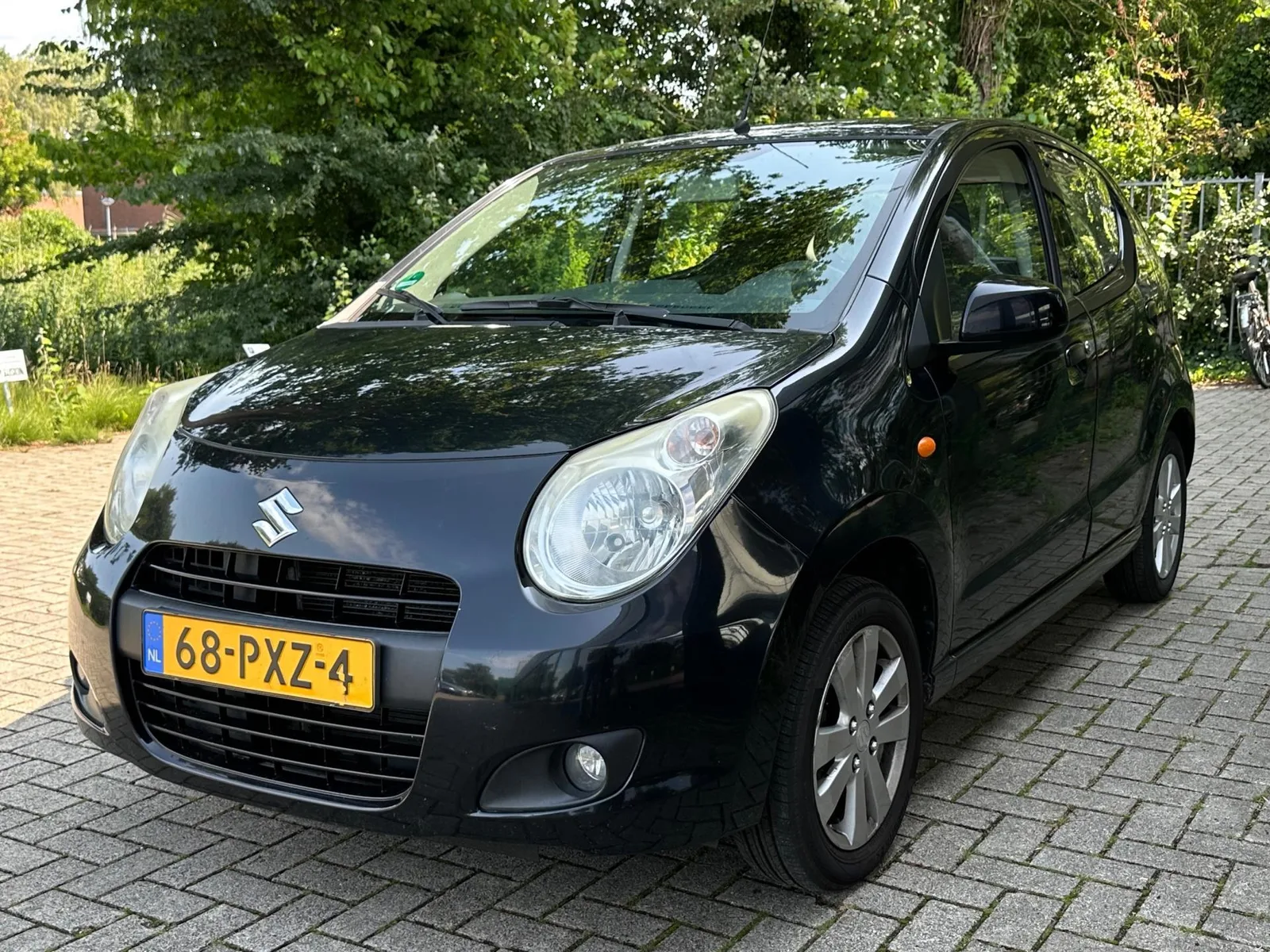 Suzuki Alto (2011) — foto 1