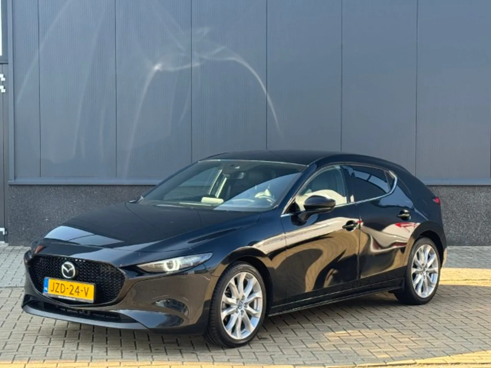 Mazda 3 (2022) — foto 1