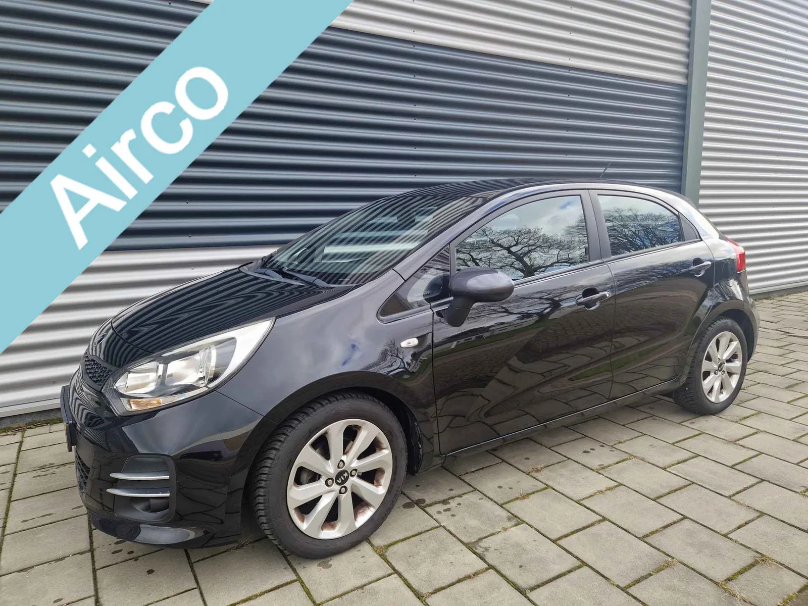 Kia Rio (2015) — foto 1