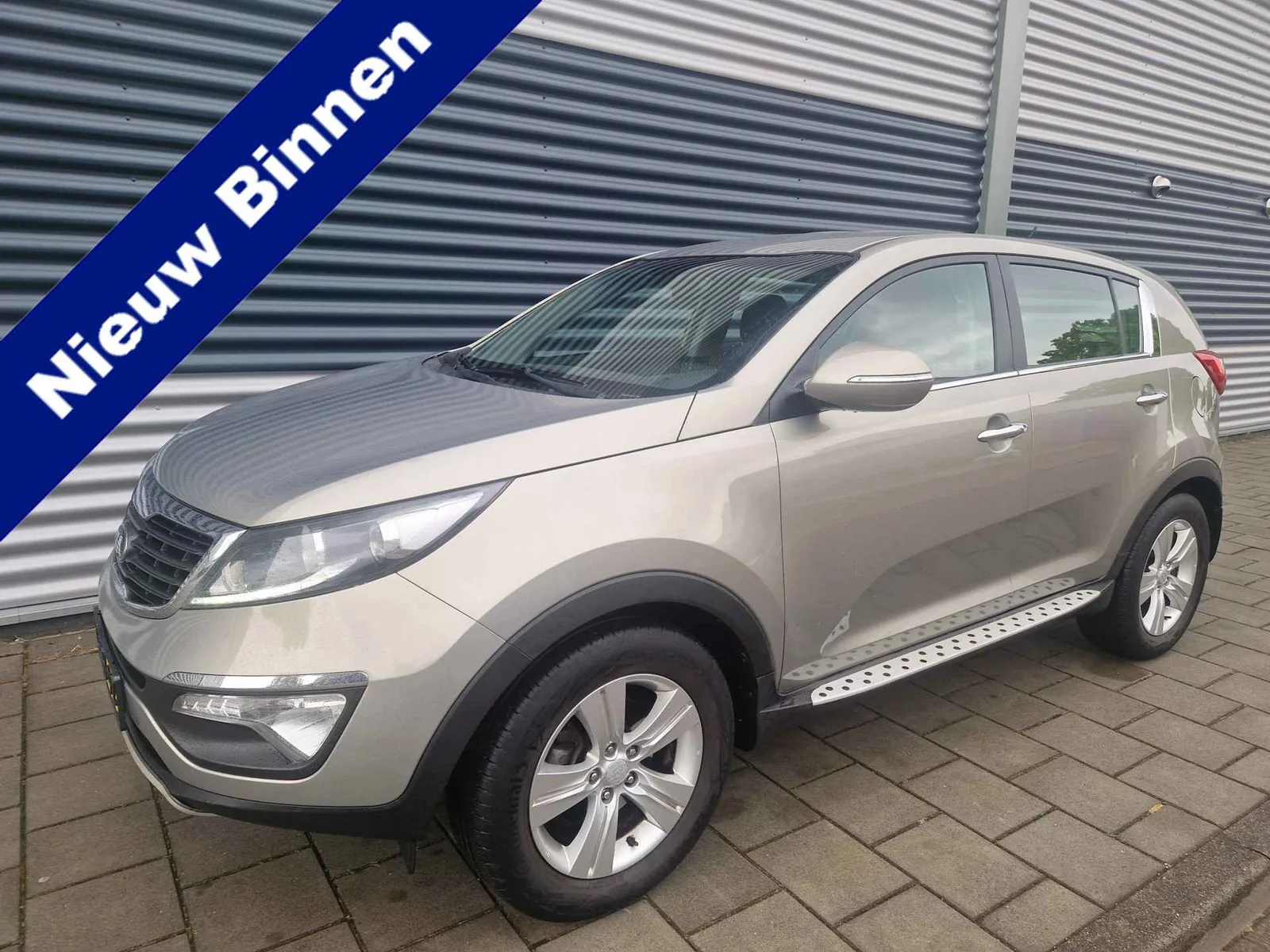 Kia Sportage (2013) — foto 1