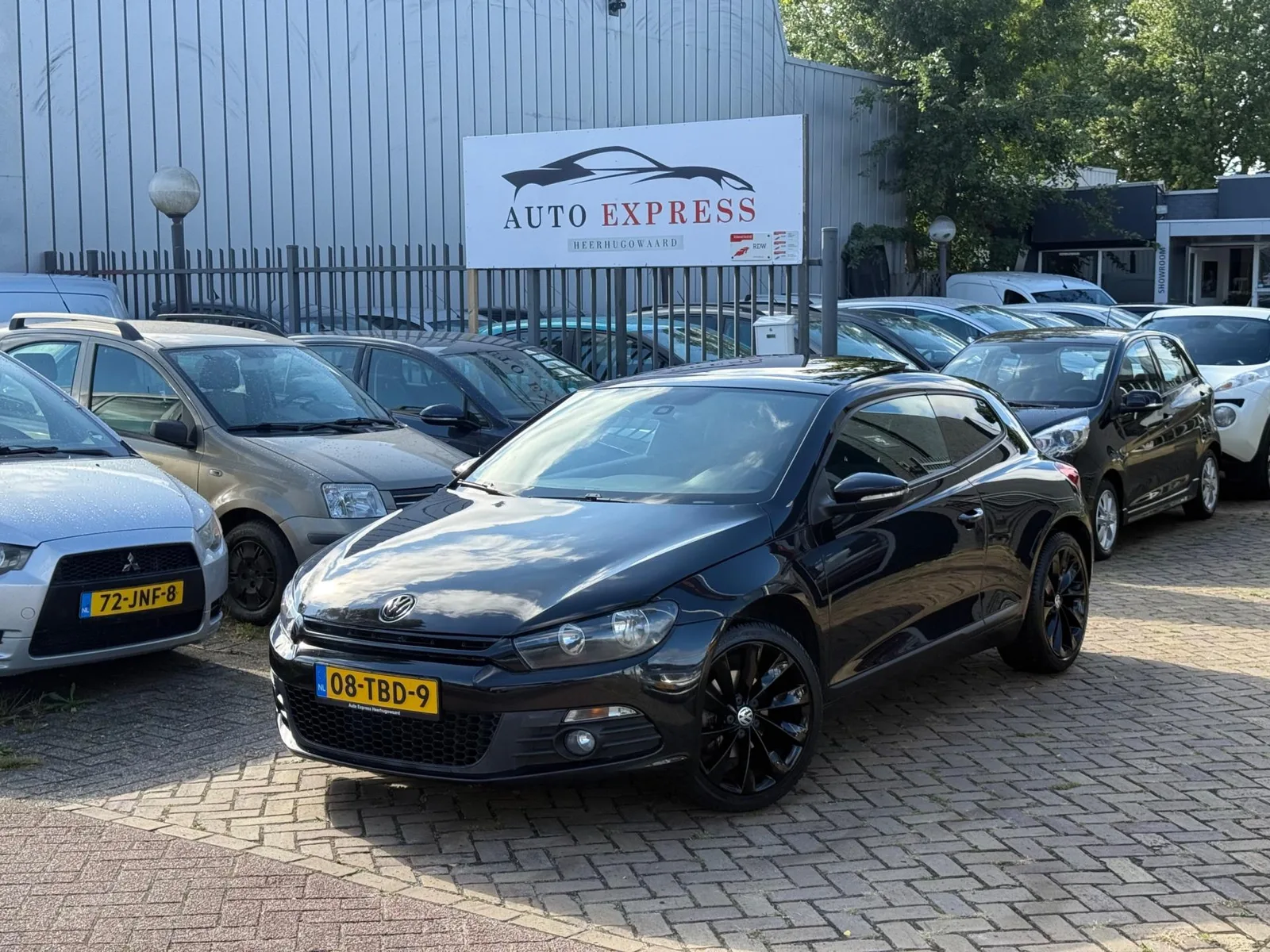 Volkswagen Scirocco (2012) — foto 1