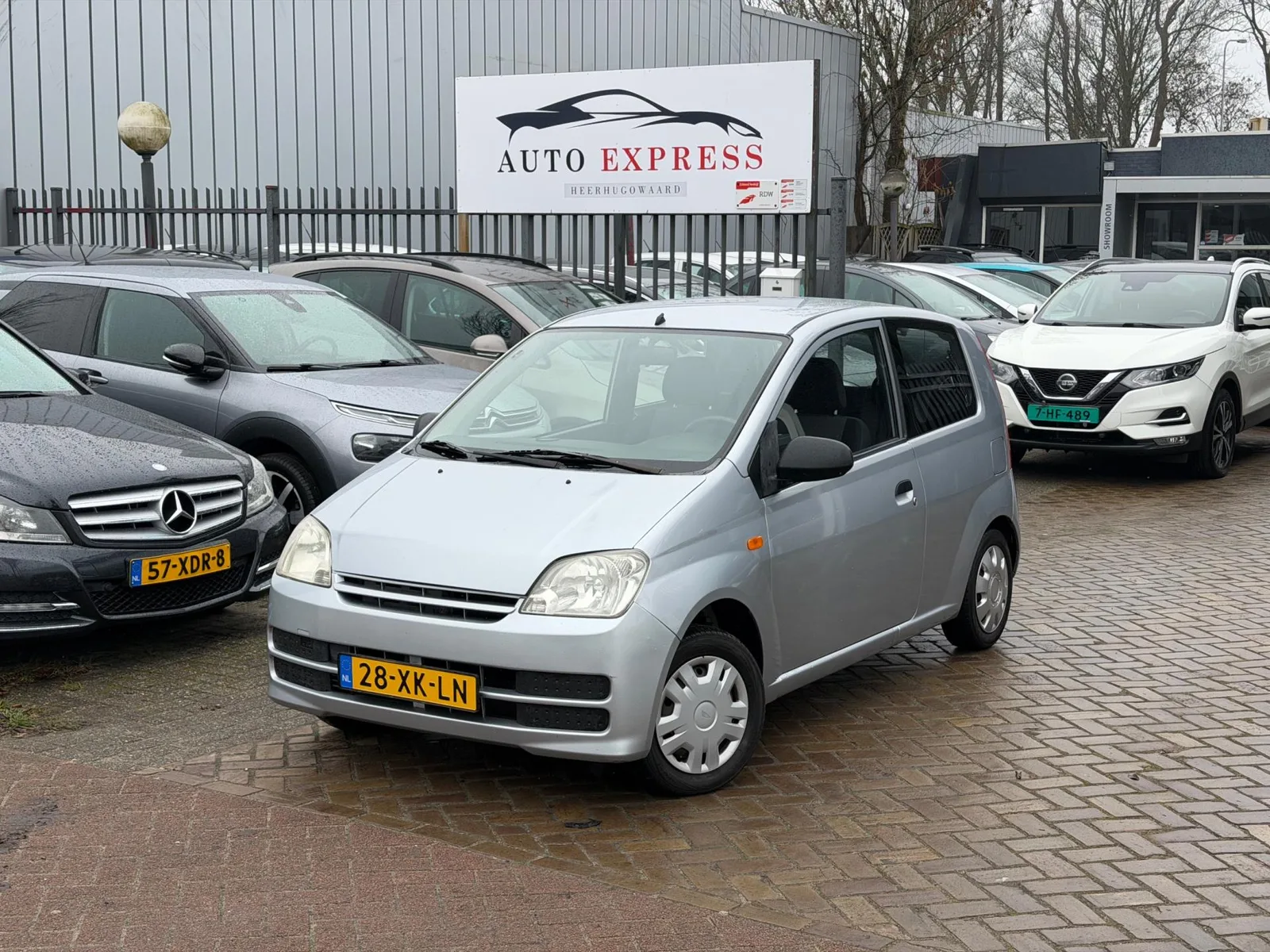 Daihatsu Cuore (2007) — foto 1