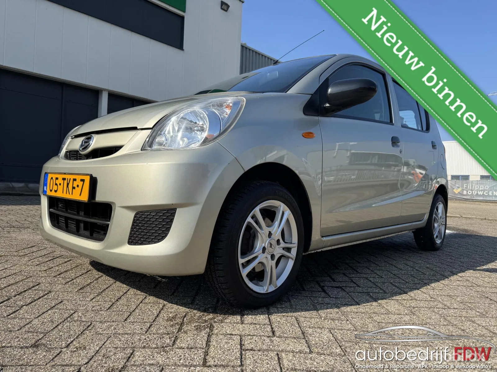 Daihatsu Cuore (2012) — foto 1
