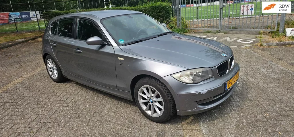 BMW 1-Serie (2009) — foto 1