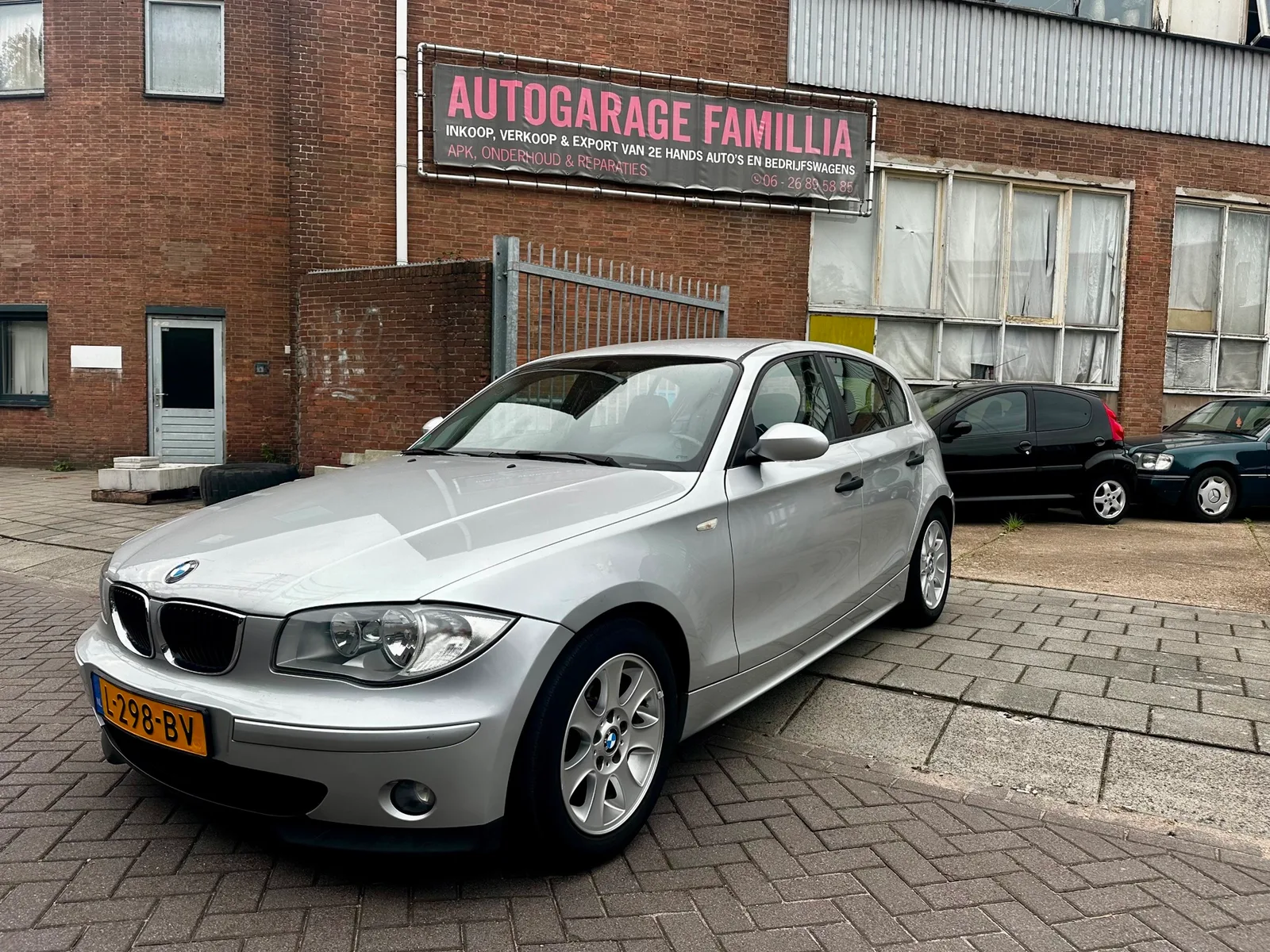 BMW 1-Serie (2006) — foto 1