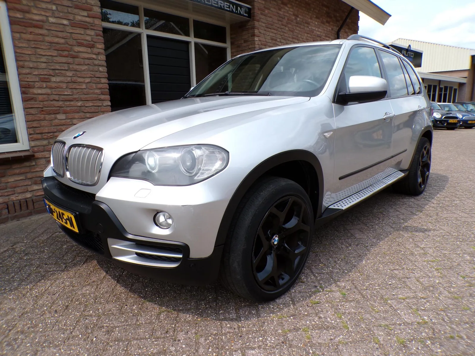BMW X5 (2009) — foto 1