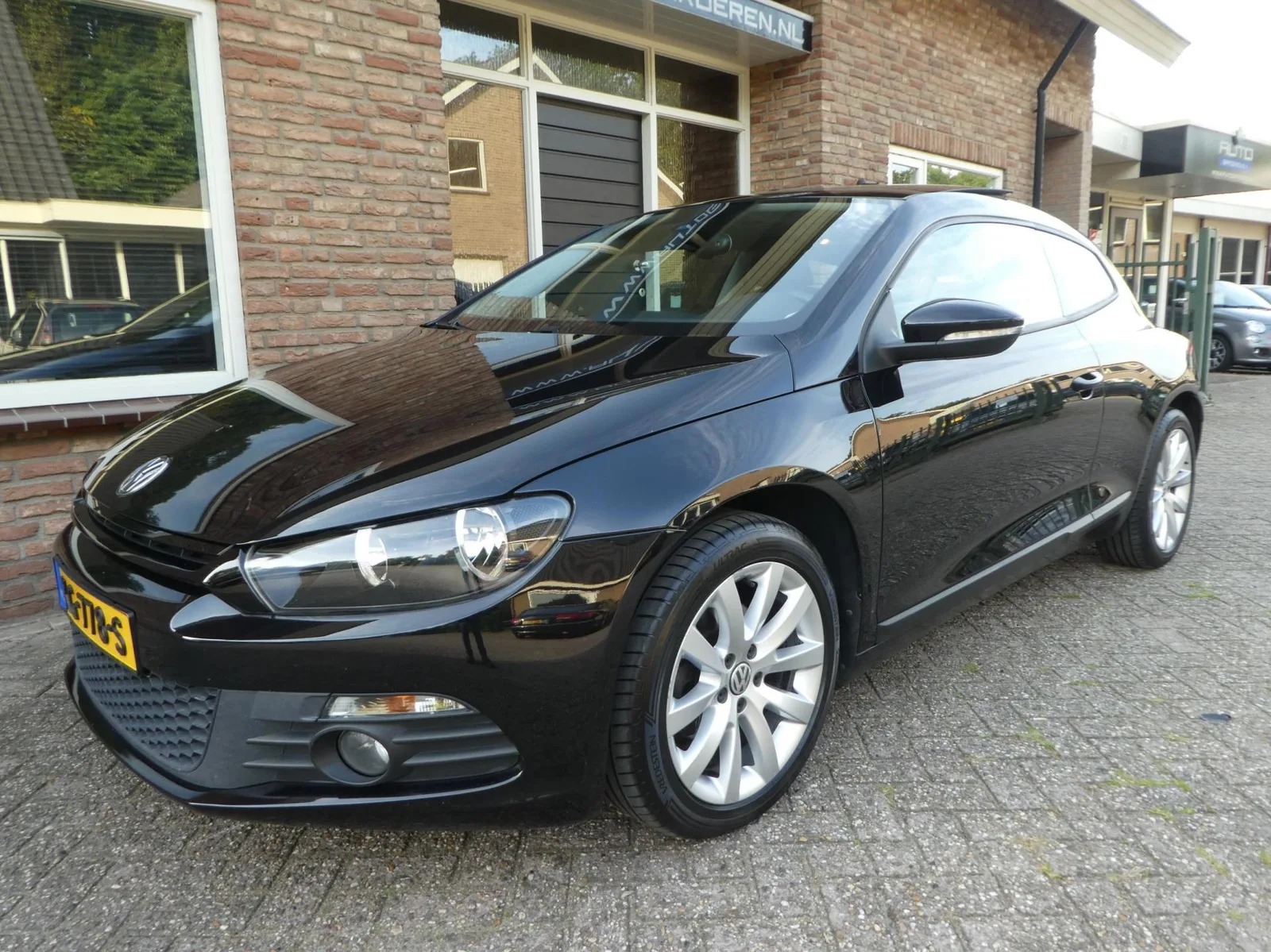 Volkswagen Scirocco (2013) — foto 1