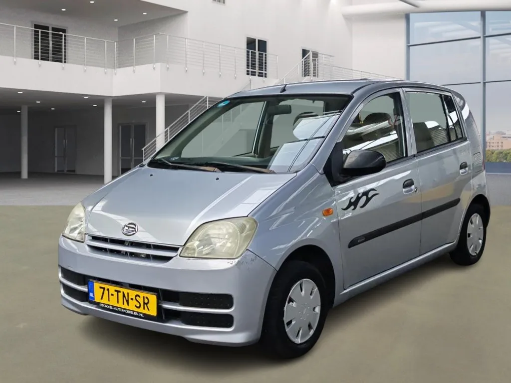 Daihatsu Cuore (2006) — foto 1