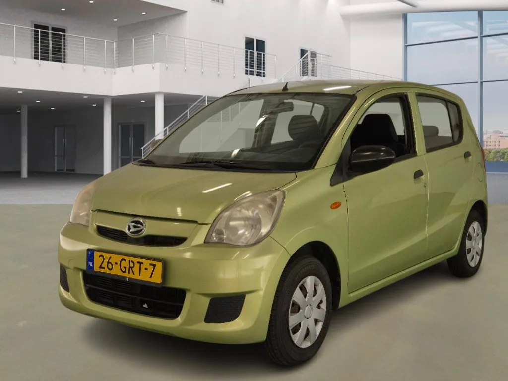 Daihatsu Cuore (2008) — foto 1