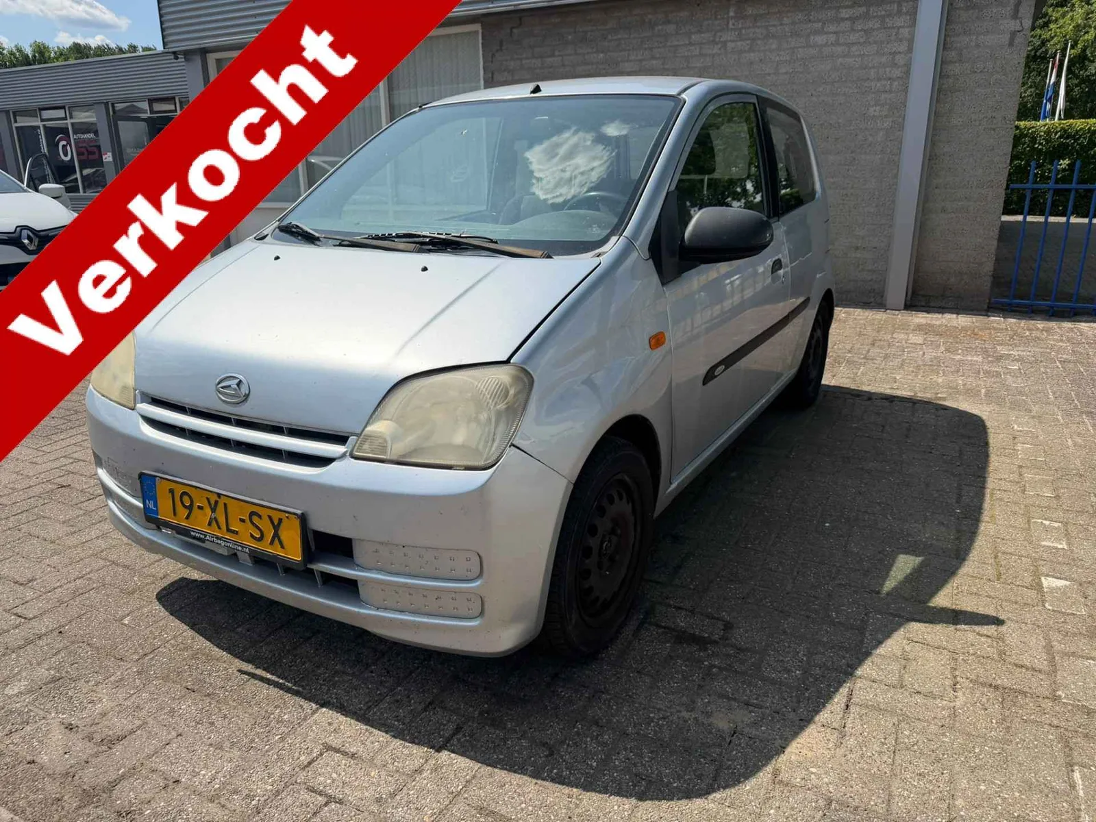 Daihatsu Cuore (2007) — foto 1