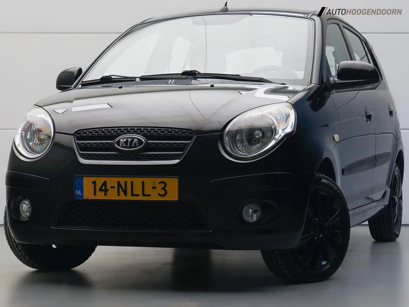 Kia Picanto (2010) — foto 1
