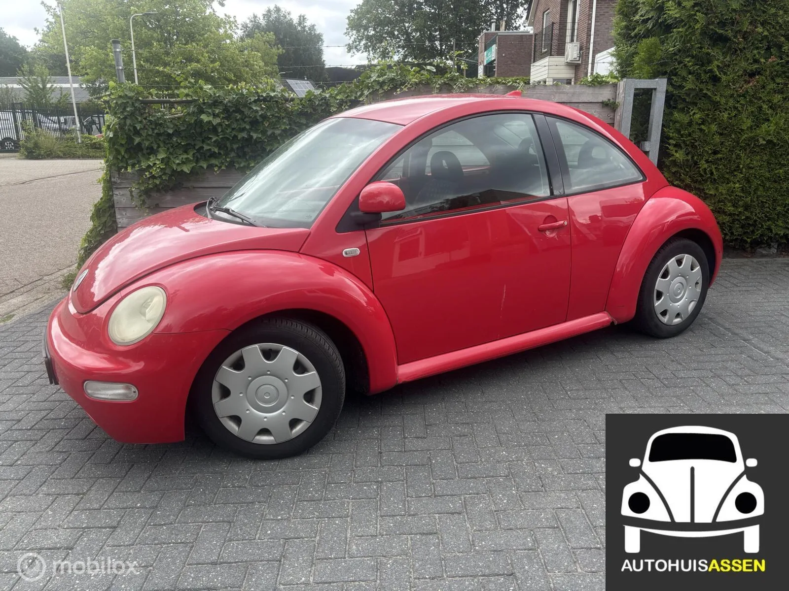 Volkswagen New Beetle (2000) — foto 1