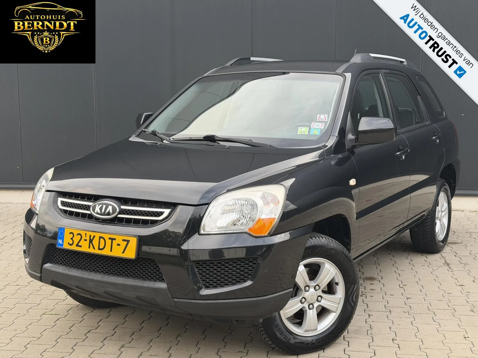 Kia Sportage (2009) — foto 1