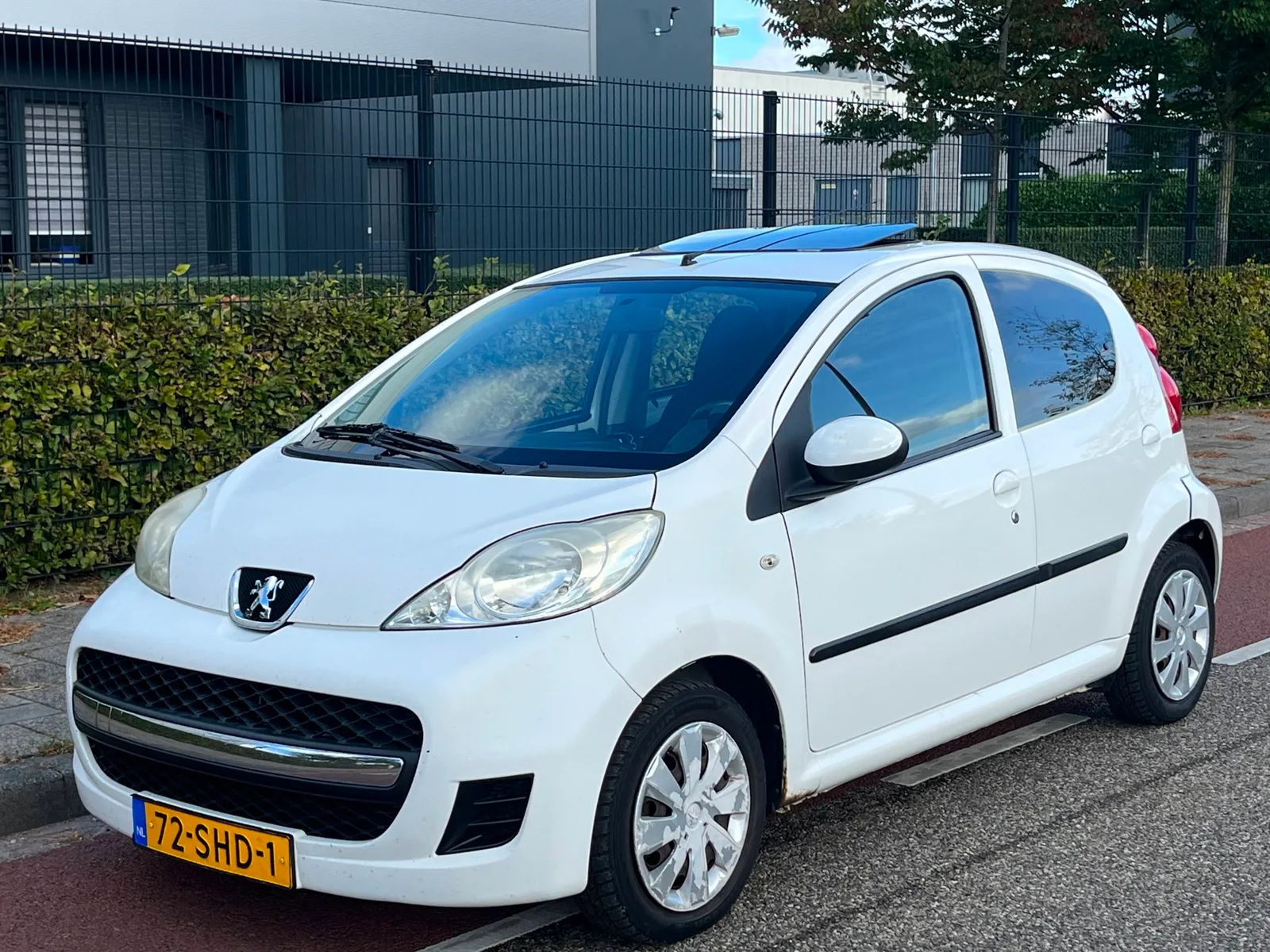Peugeot 107 (2011) — foto 1