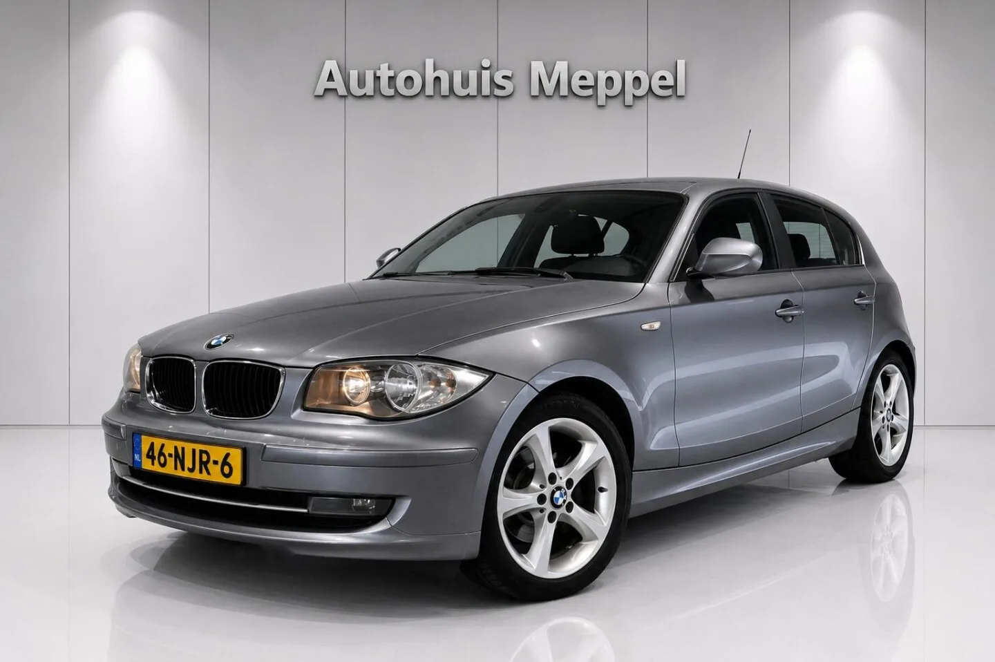 BMW 1-Serie (2010) — foto 1
