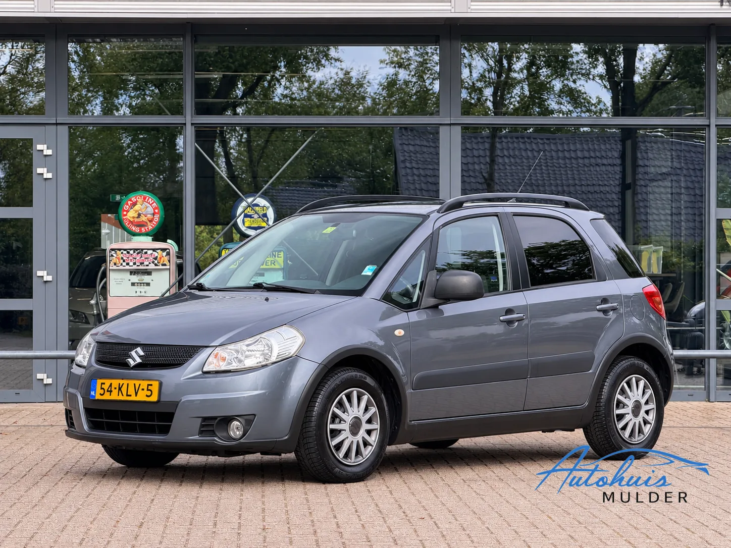 Suzuki SX4 (2010) — foto 1