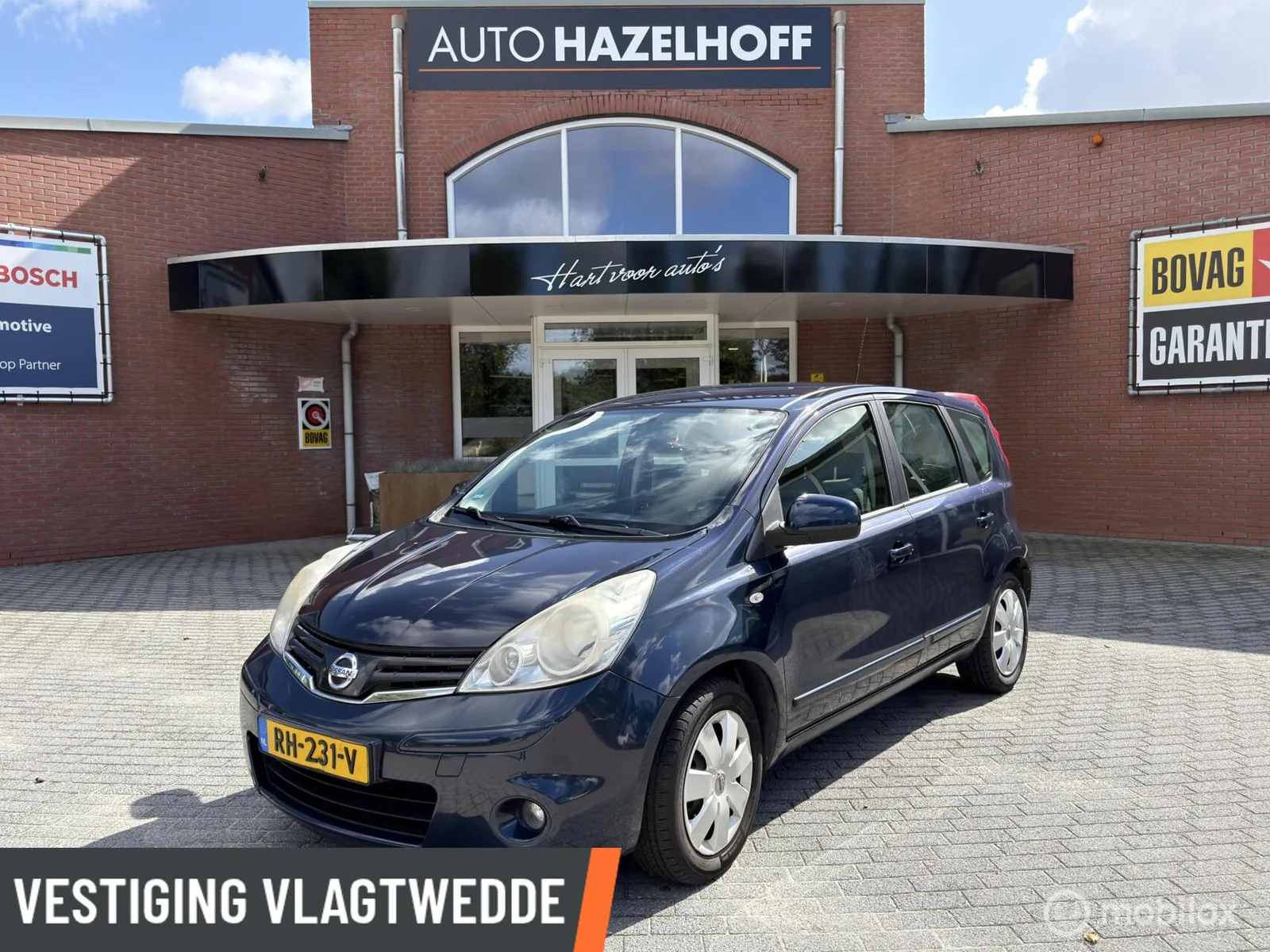 Nissan Note (2010) — foto 1