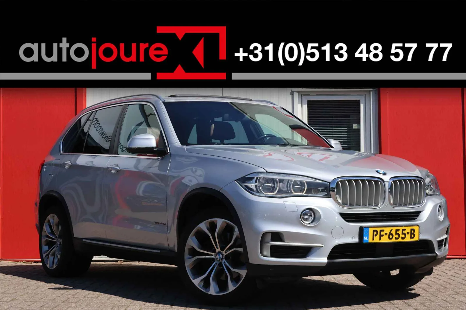 BMW X5 (2014) — foto 1
