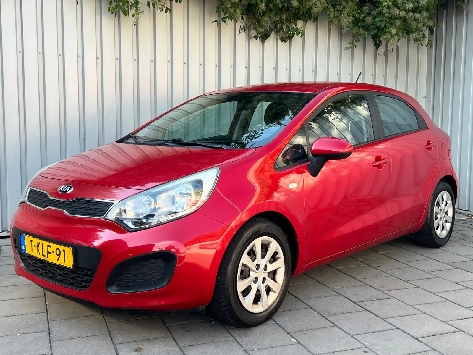 Kia Rio (2013) — foto 1
