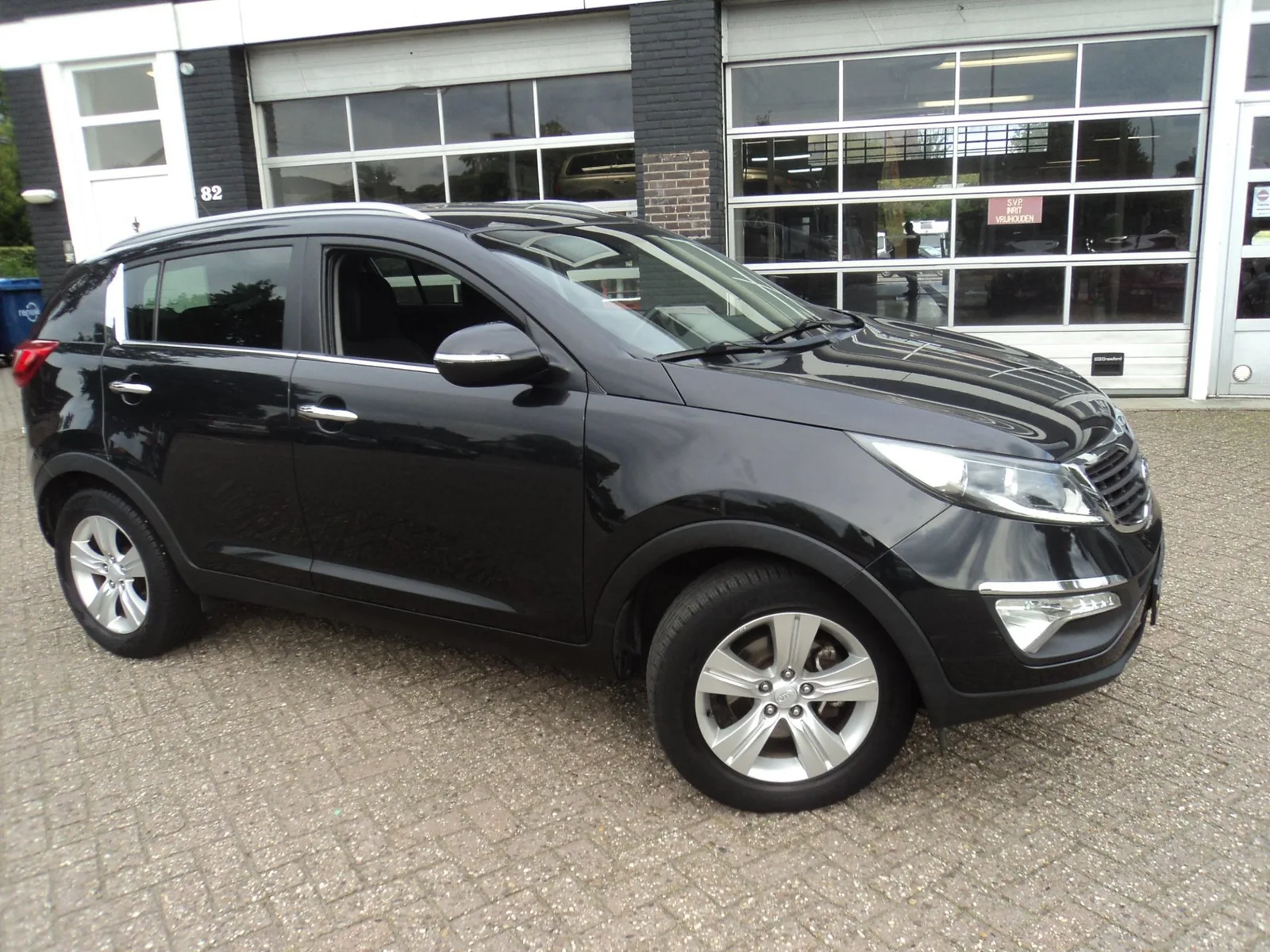 Kia Sportage (2012) — foto 1