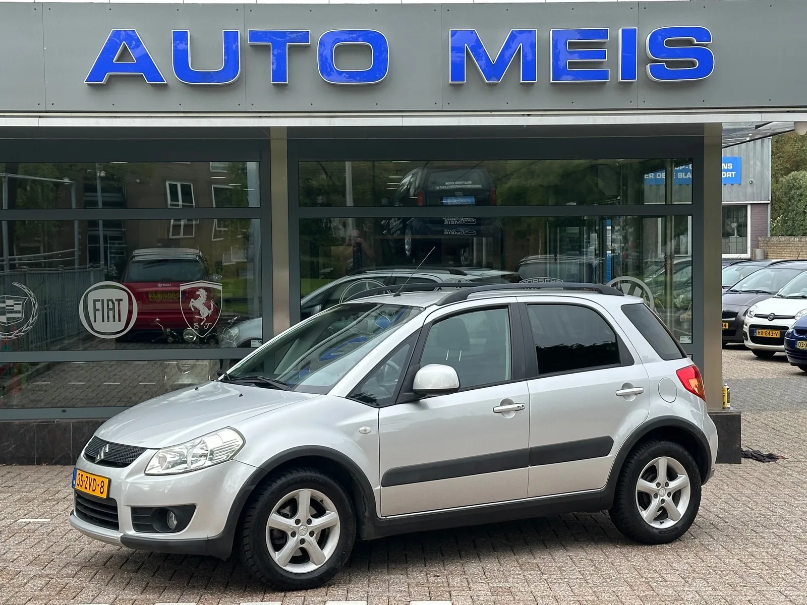 Suzuki SX4 (2008) — foto 1