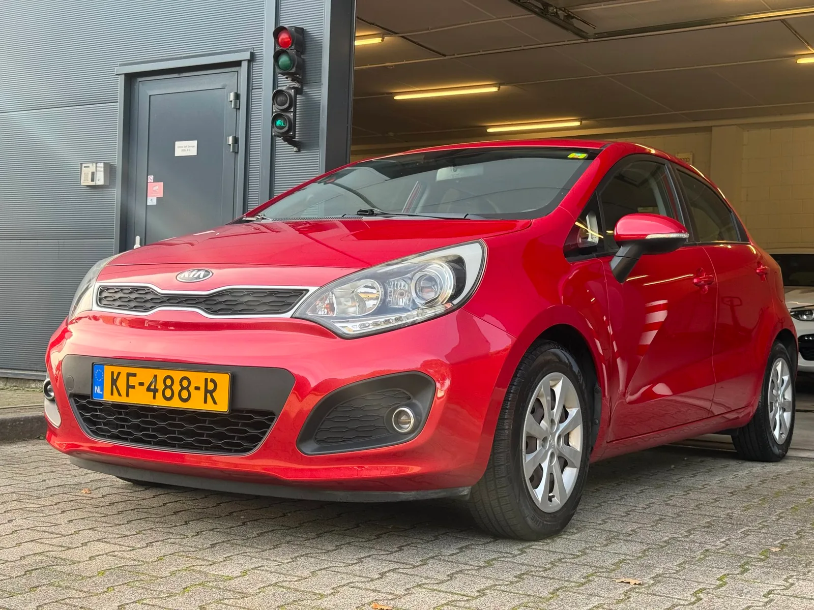 Kia Rio (2014) — foto 1
