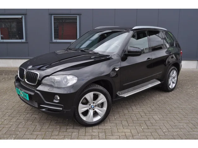BMW X5 (2009) — foto 1