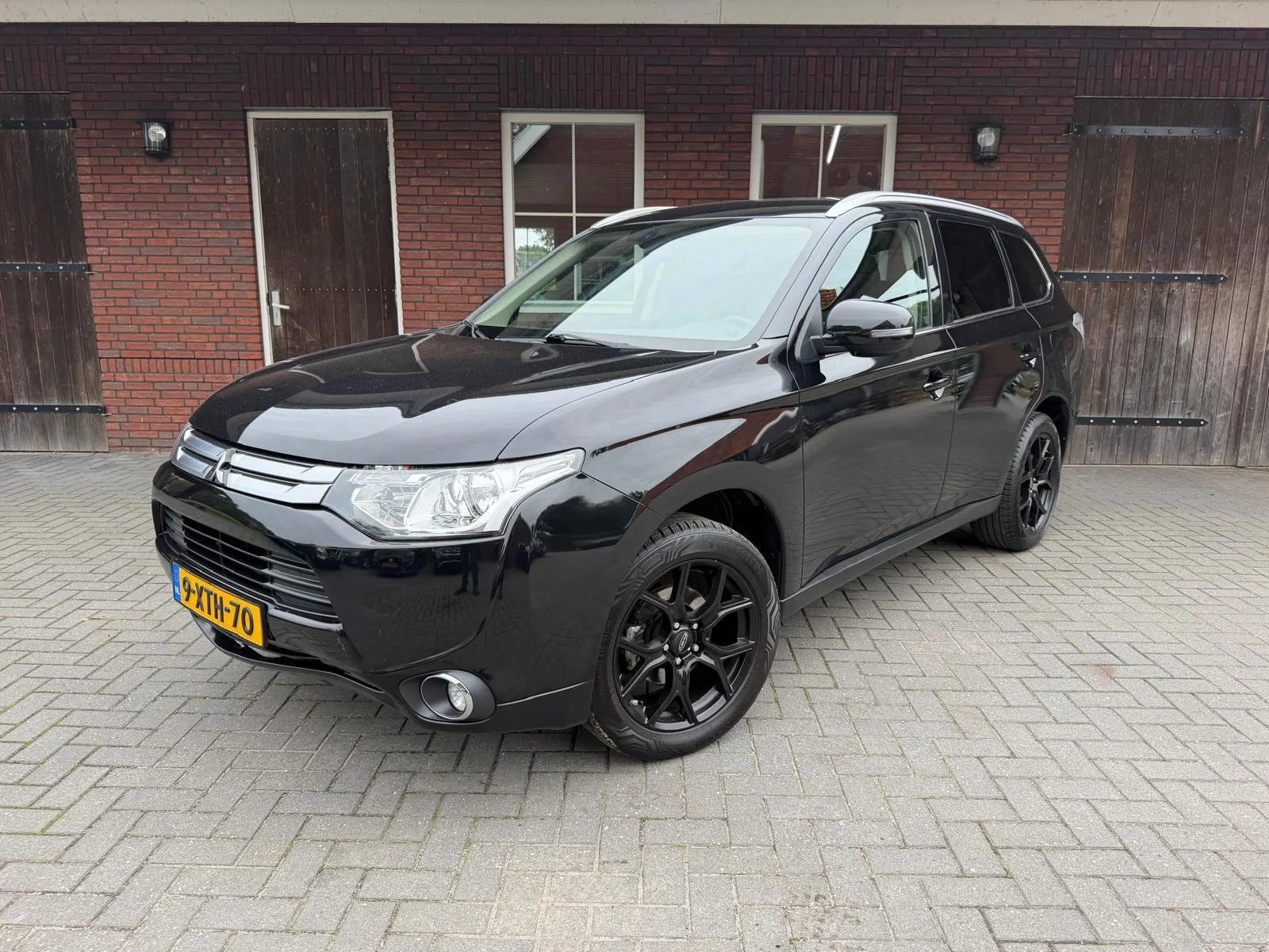 Mitsubishi Outlander (2014) — foto 1