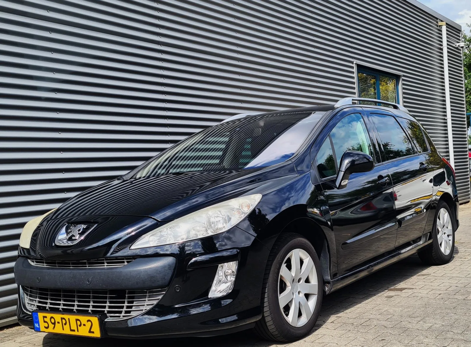 Peugeot 308 (2011) — foto 1