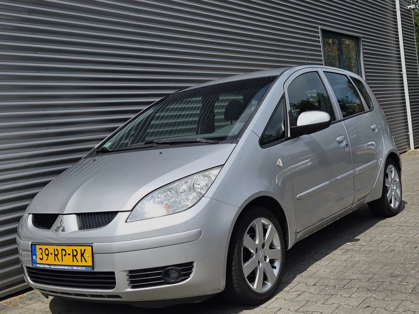 Mitsubishi Colt (2005) — foto 1