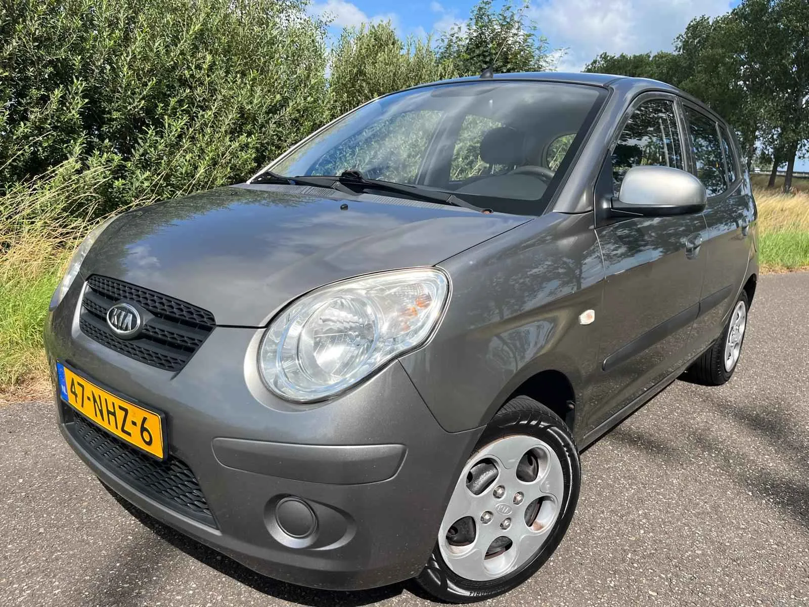 Kia Picanto (2010) — foto 1