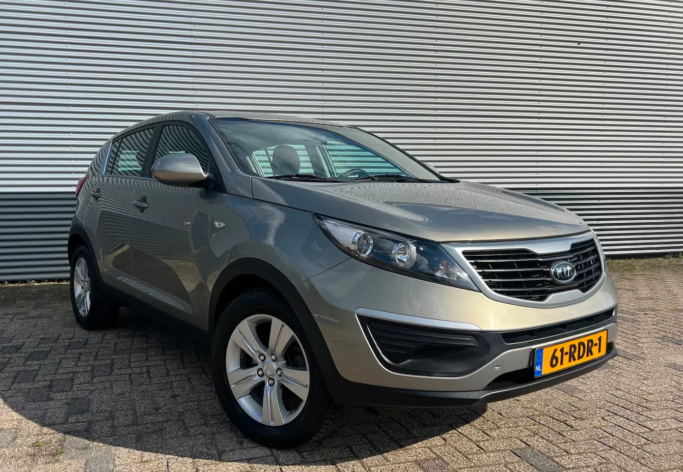 Kia Sportage (2011) — foto 1