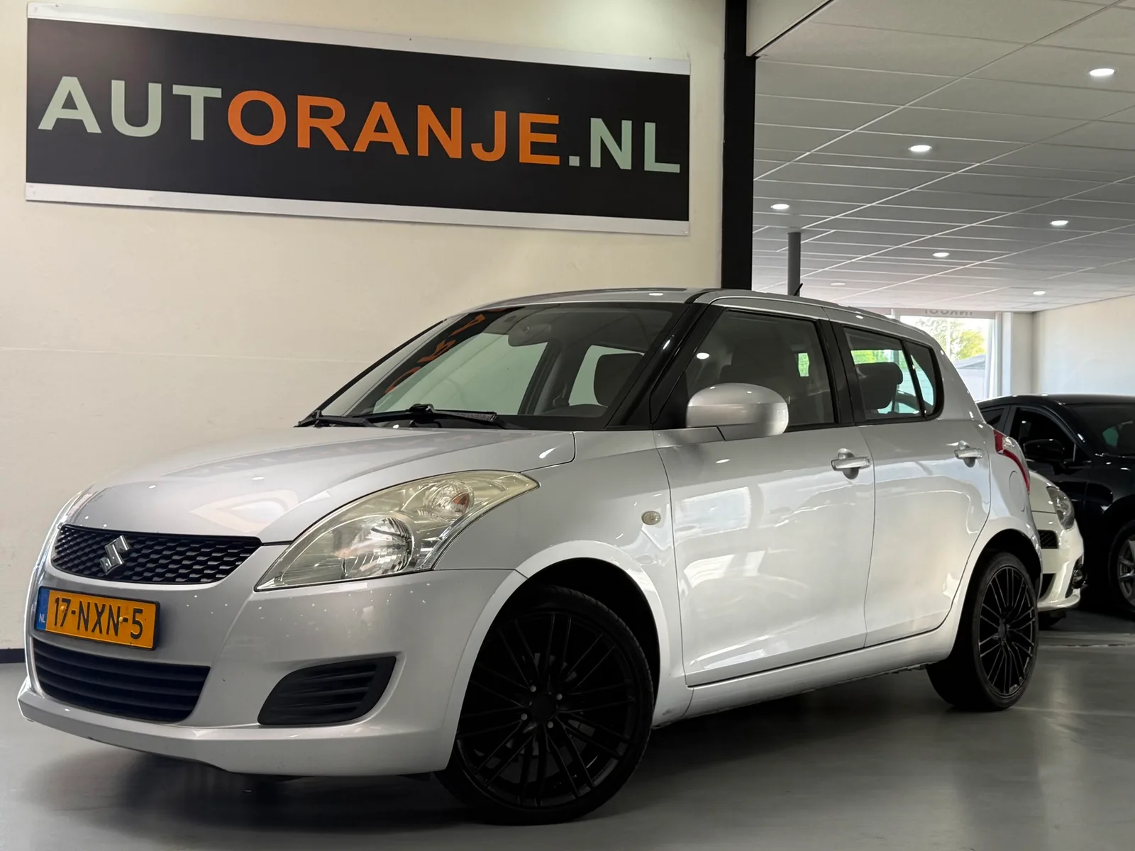 Suzuki Swift (2011) — foto 1