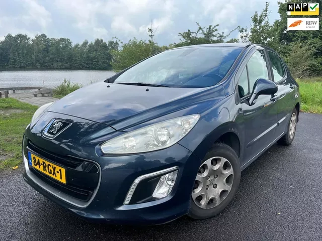 Peugeot 308 (2011) — foto 1
