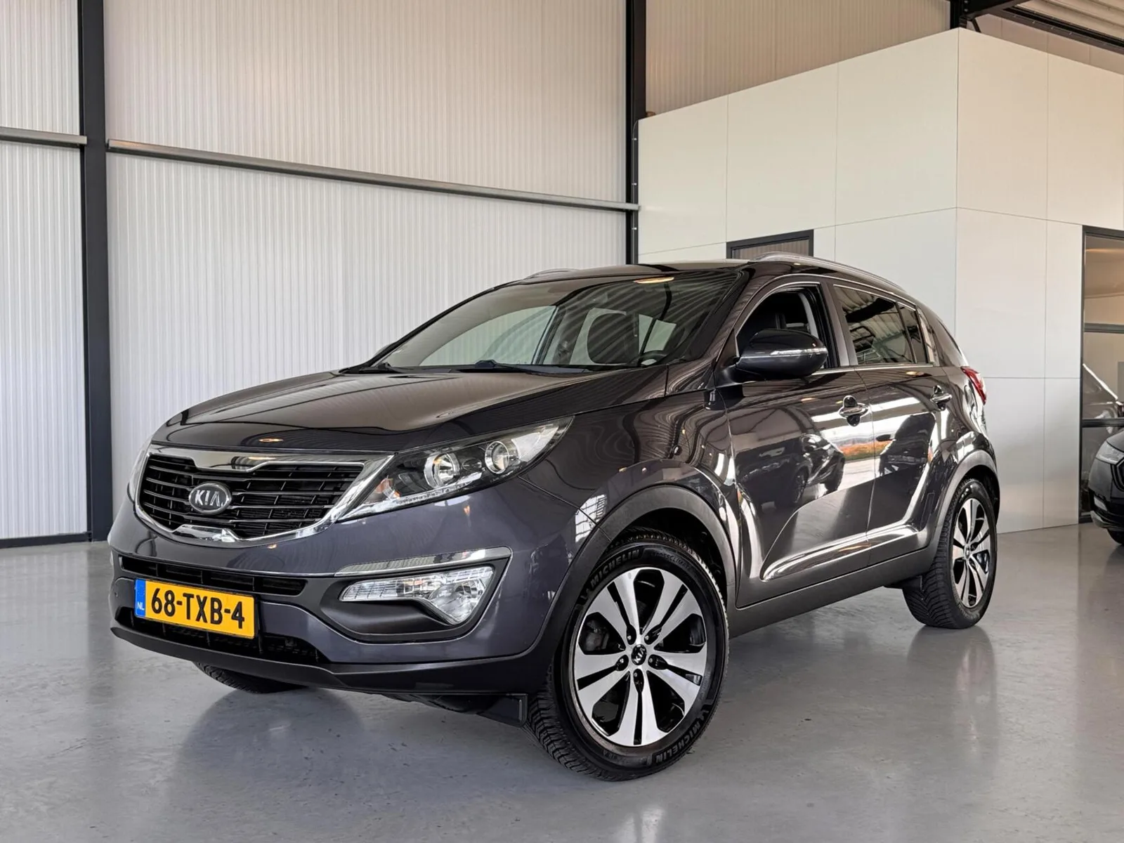 Kia Sportage (2012) — foto 1