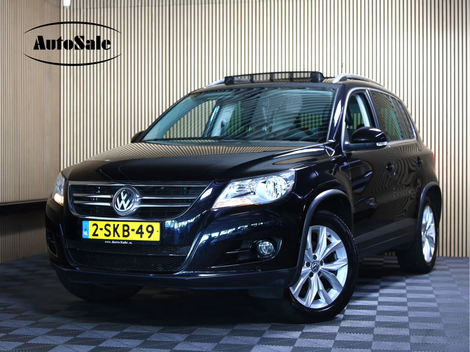 Volkswagen Tiguan (2010) — foto 1
