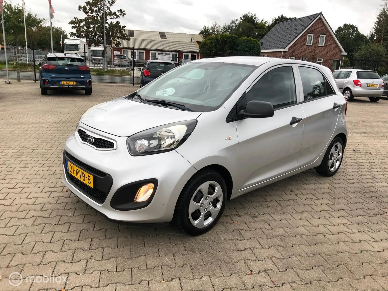 Kia Picanto (2011) — foto 1