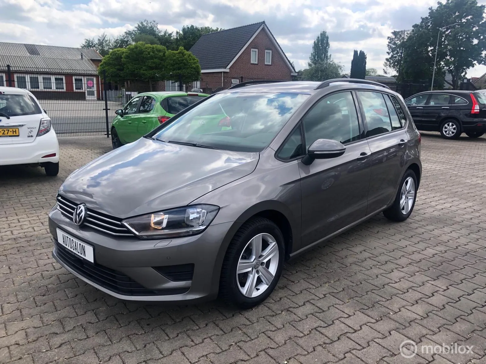 Volkswagen Golf Sportsvan (2014) — foto 1
