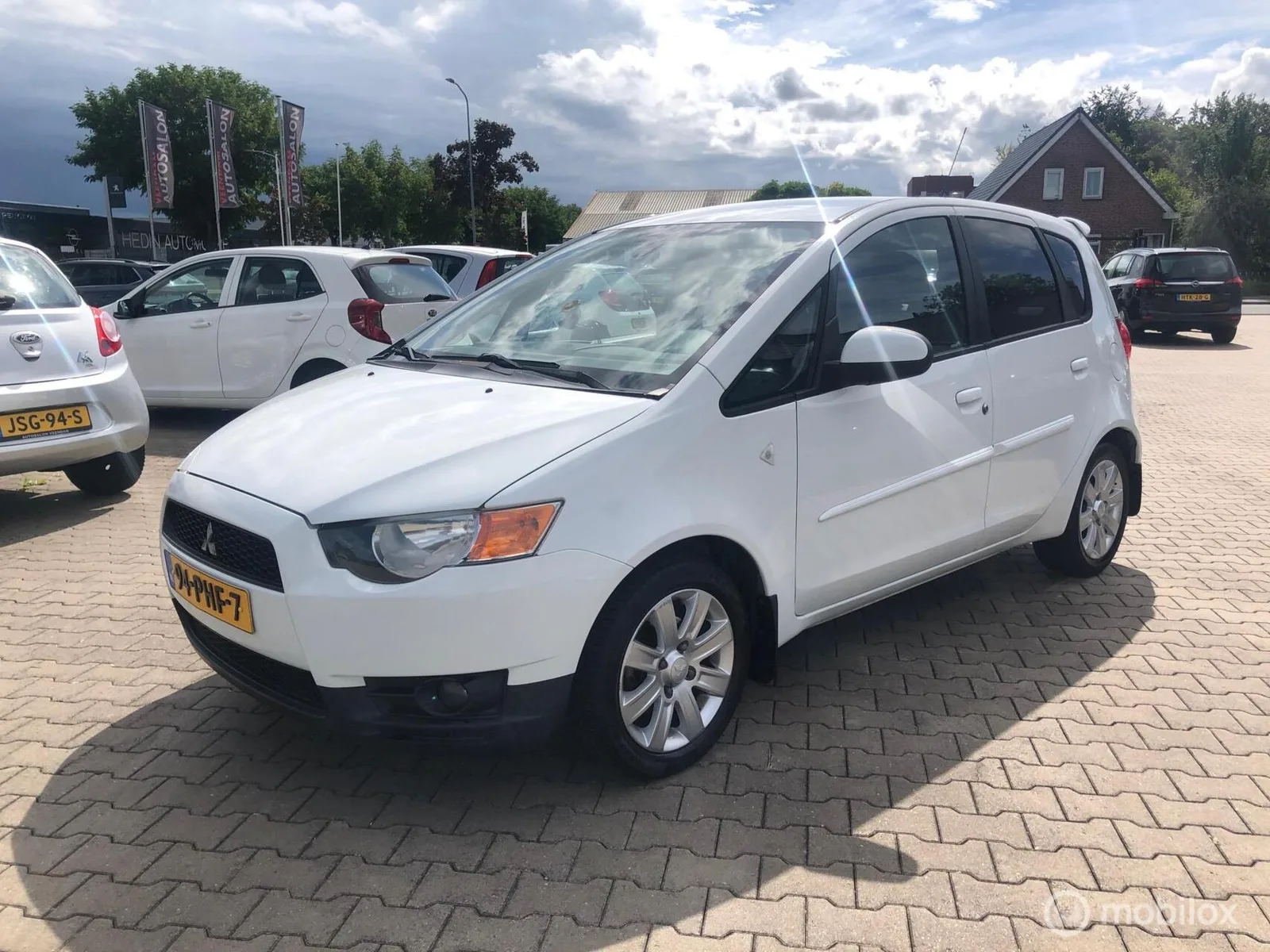 Mitsubishi Colt (2011) — foto 1