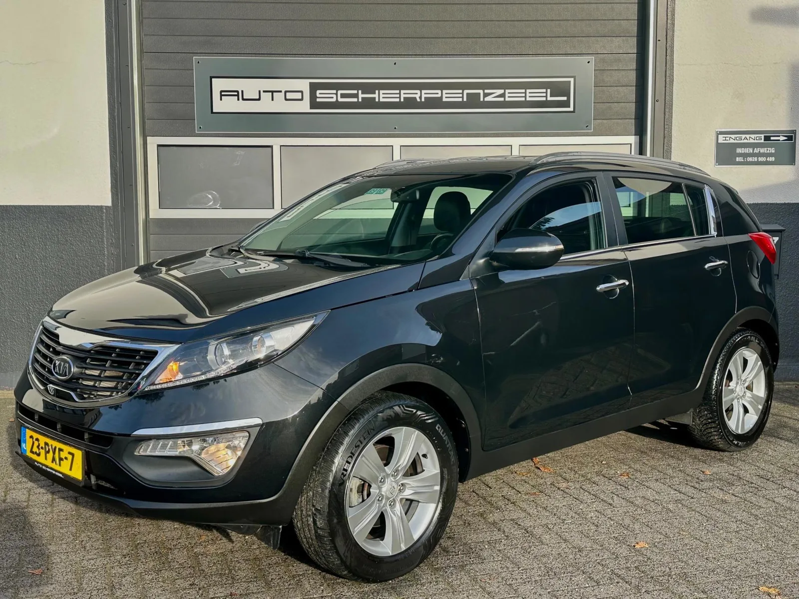 Kia Sportage (2011) — foto 1