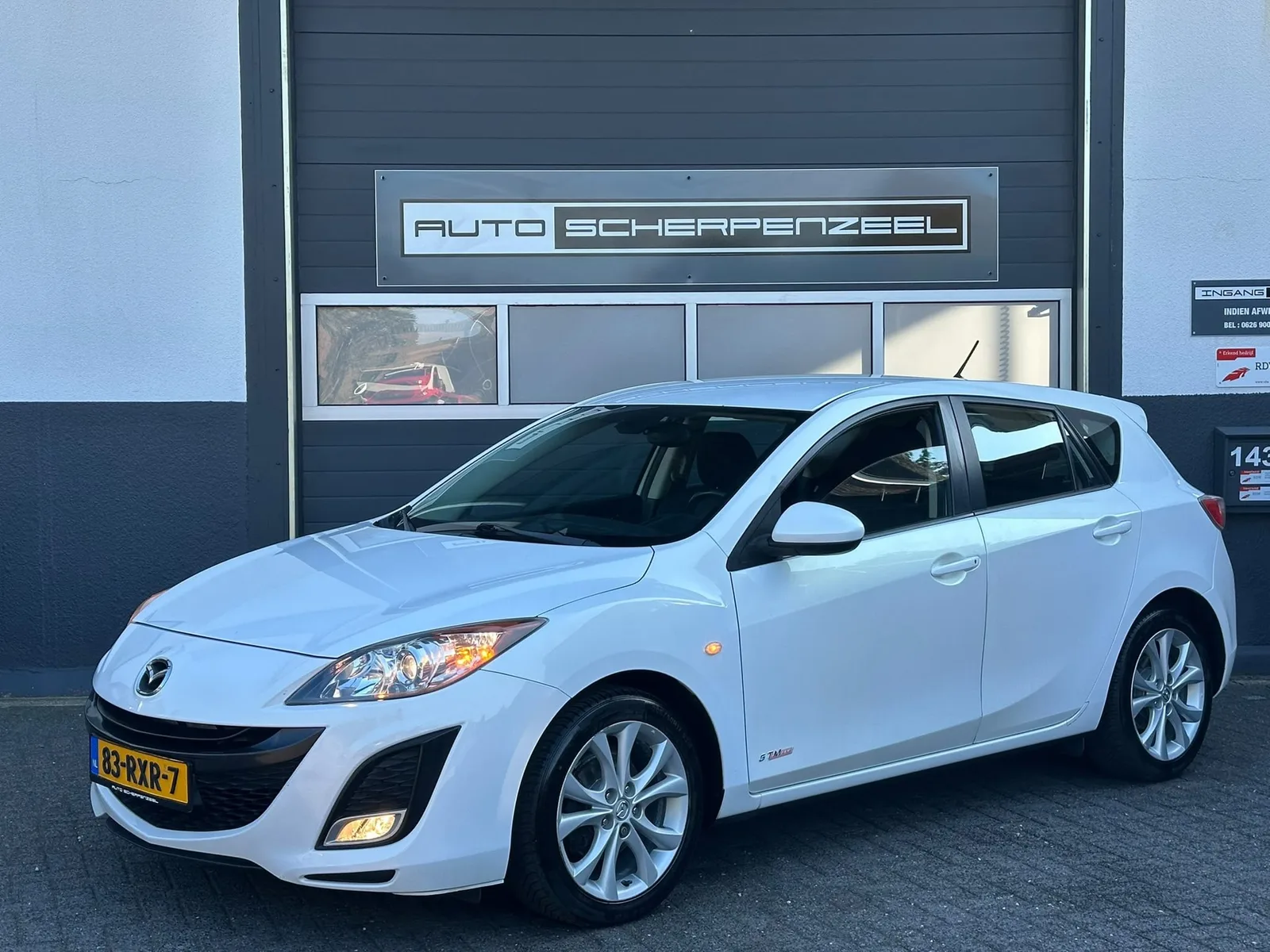Mazda 3 (2011) — foto 1