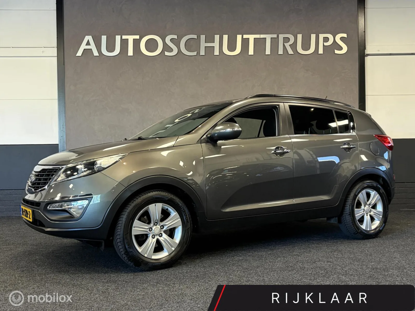 Kia Sportage (2012) — foto 1