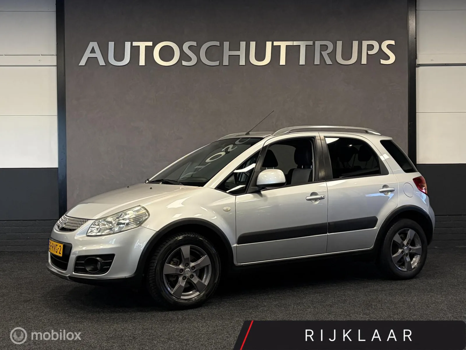 Suzuki SX4 (2011) — foto 1